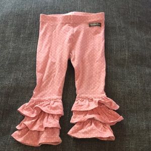 Cute pink polka dot ruffled pants.